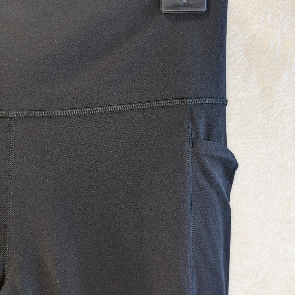 Athleta Black Leggings Salutation Stash Pocket 11 XL 7/8 Length - Picture 3 of 9